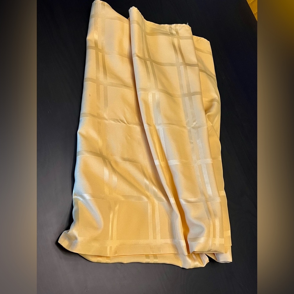 Wamsutta Solid 52”x72” tablecloth in canary yellow.  Tonal, geometric design.